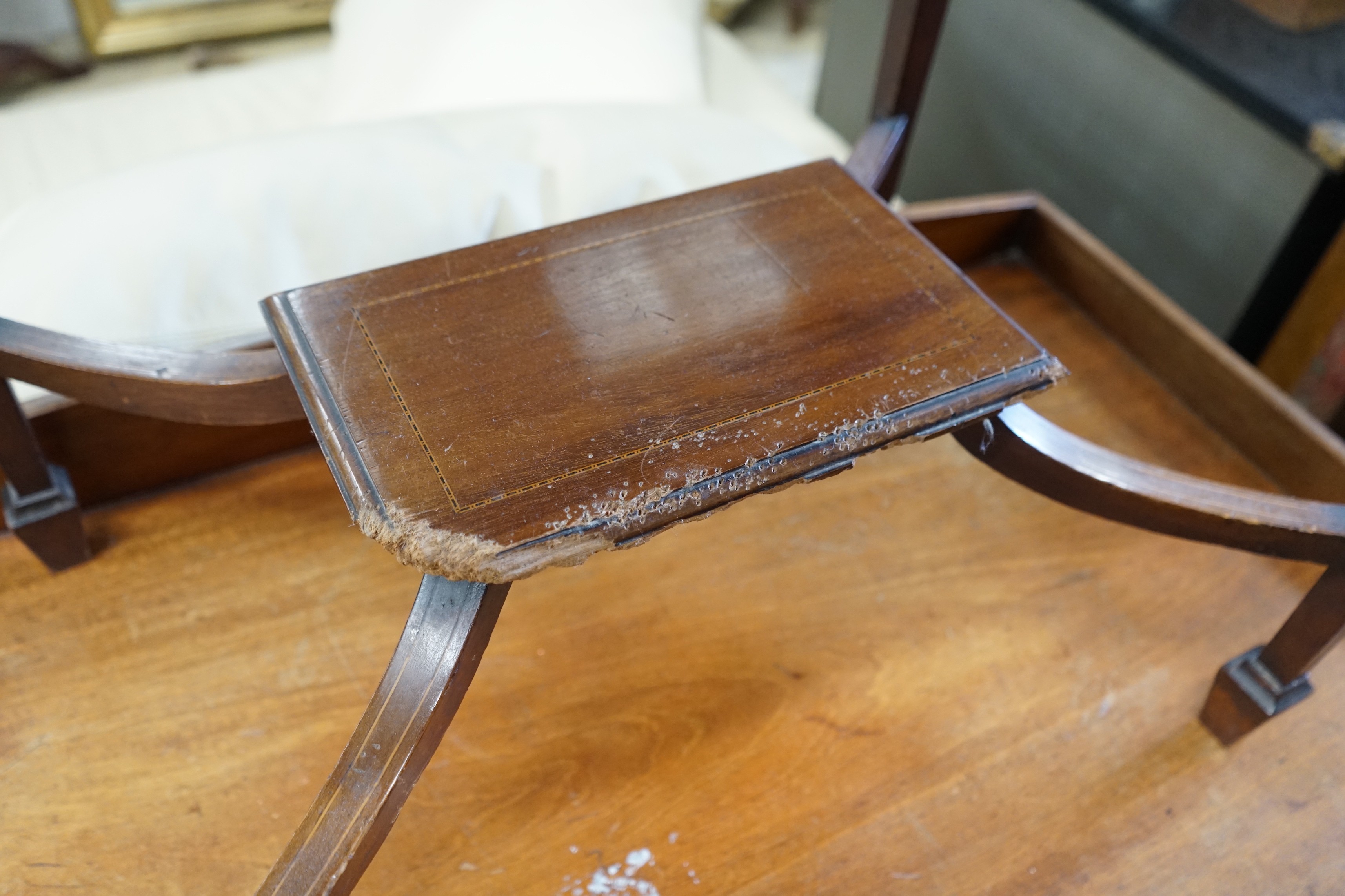 An Edwardian rectangular mahogany hinged top writing table, width 62cm, depth 45cm, height 74cm